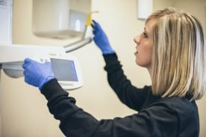 Dentist Examining Diagnostic Instrument