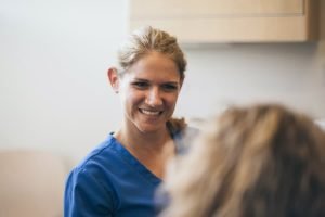 Dental Hygienist With Patient