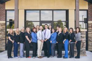 Dexter Family Dentistry staff standing outside the office