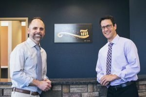 Doctor Brent Kolb and Doctor Derek Robison standing inside the office